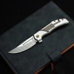 ⁦KANSEPT ORION LIMITED VERSION FLIPPER BRONZE ANODIZED AND MACHINE SATIN TITANIUM HANDLE (3.07" MACHINE SATIN CPM S35VN WITH CNC MILLING BLADE) JB STOUT DESIGN⁩ - الصورة ⁦2⁩
